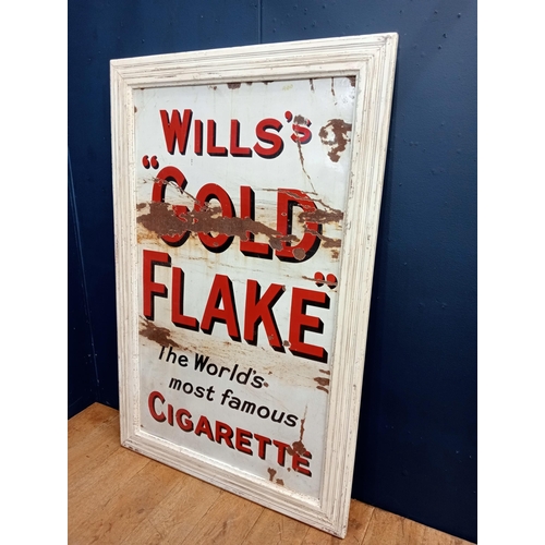 421 - A VINTAGE ENAMEL SIGN inscribed 'Wills Gold Flake The World's Most Famous Cigarette' in painted fram... 