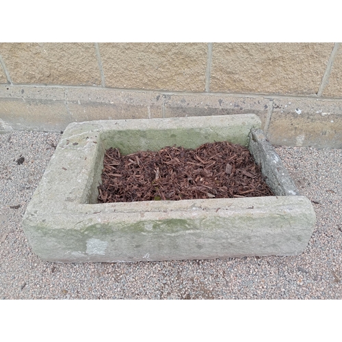 427 - A SANDSTONE TROUGH of rectangular form 20cm (h) x 82cm (w) x 54cm (d)