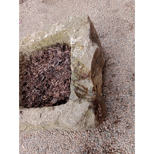 429 - A COMPOSITION STONE TROUGH of square form 32cm (h) x 53cm (w) x 53cm (d)