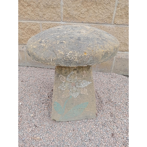 433 - A COMPOSITION SANDSTONE SADDLE STONE the cylindrical top above a spreading column 50cm (h) x 45cm (d... 