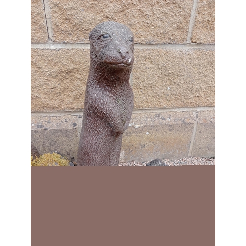 435 - A COMPOSITION STONE WATER FEATURE the rockwork base shown with otters 55cm (h) x 65cm (w) x 52cm (d)