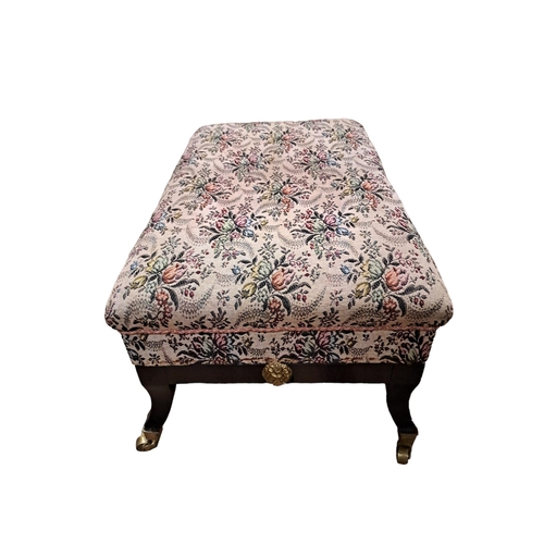 44 - A VINTAGE EBONISED AND UPHOLSTERED STOOL the rectangular upholstered seat above a moulded apron with... 