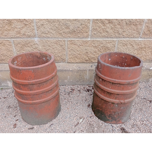 443 - A PAIR OF RED TERRACOTTA CHIMNEY POTS each of cylindrical form with band decoration 45cm (h) x 28cm ... 