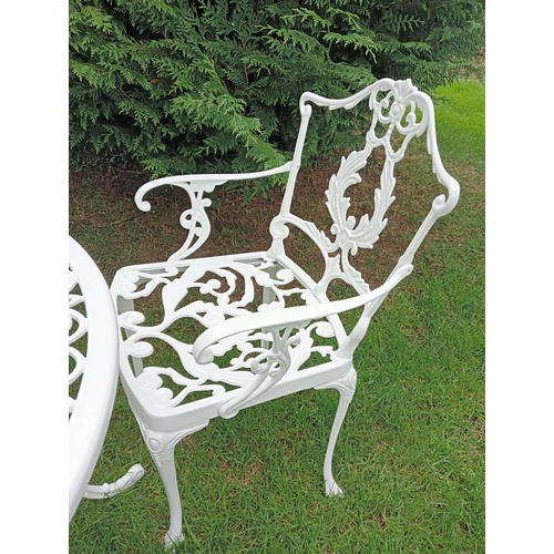 445 - A FIVE PIECE ALUMINIUM PATIO SUITE comprising four elbow chairs each with a pierced foliate back and... 