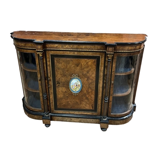 449 - A 19TH CENTURY WALNUT EBONISED AND GILT BRASS MOUNTED SIDE CABINET of rectangular bowed breakfront o... 