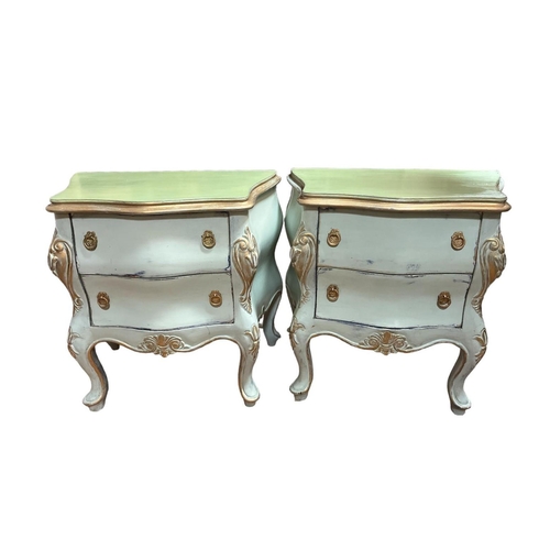 519 - A PAIR OF CONTINENTAL HARDWOOD PAINTED AND PARCEL GILT CHESTS each of bombe outline the shaped tops ... 