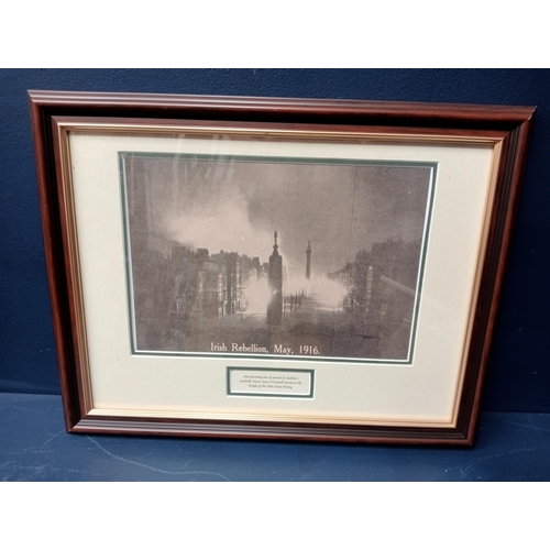 525 - A BLACK AND WHITE PRINT Irish Rebellion 1916 in stained wood and gilt frame 36cm (h) x 46cm (w)