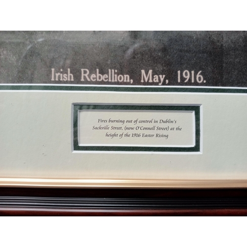 525 - A BLACK AND WHITE PRINT Irish Rebellion 1916 in stained wood and gilt frame 36cm (h) x 46cm (w)