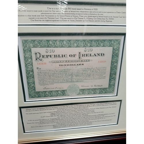 526 - A FRAMED REPUBLIC OF IRELAND BOND CERTIFICATE 1920 depicting Eamon De Valera and Michael Collins in ... 