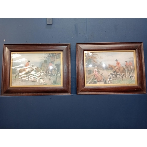 528 - A PAIR OF VINTAGE COLOURED PRINTS hunting scenes in oak frames 45cm (h) x 58cm (w)