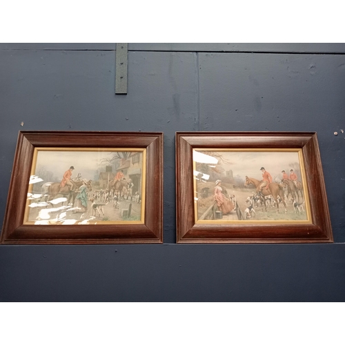 528 - A PAIR OF VINTAGE COLOURED PRINTS hunting scenes in oak frames 45cm (h) x 58cm (w)