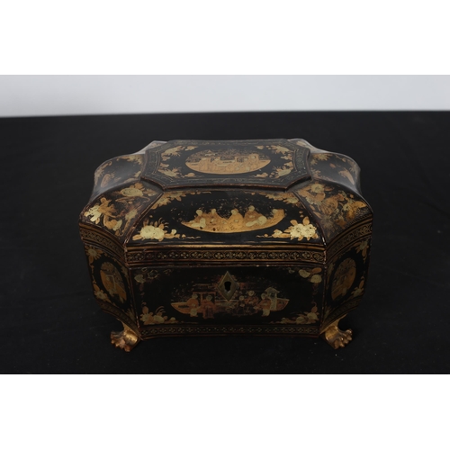 565 - A 19TH CENTURY CHINESE BLACK LACQUERED AND GILT TEA CADDY the hinged lid with pewter lidded containe... 