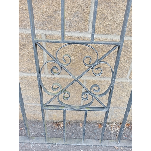 723 - A PAIR OF WROUGHT IRON ENTRANCE GATES with rectangular barring and scroll decoration 104cm (h) x 274... 