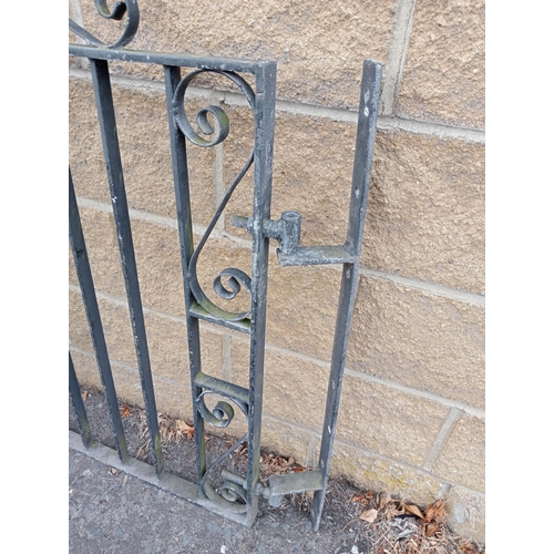 723 - A PAIR OF WROUGHT IRON ENTRANCE GATES with rectangular barring and scroll decoration 104cm (h) x 274... 