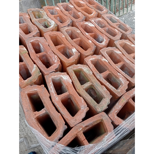 724 - TWENTY FOUR TERRACOTTA CAPPINGS each of rectangular shaped form 14cm (h) x 720cm (w) x 33cm (d)