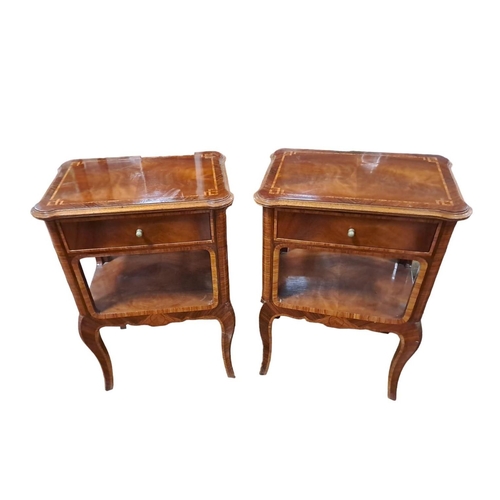 75 - A PAIR OF CONTINENTAL KINGWOOD INLAID SIDE TABLES of rectangular outline the shaped tops with eared ... 