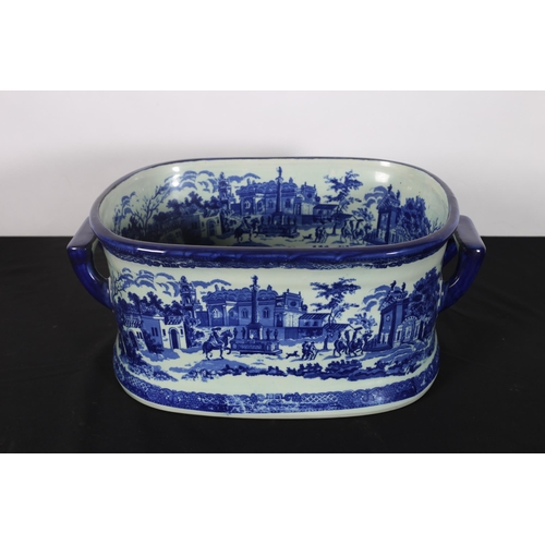 85 - AN IRONSTONE BLUE AND WHITE JARDINIERE of rectangular outline the white and blue ground decorated wi... 