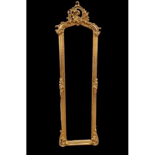 158 - A CONTINENTAL GILT FRAME MIRROR the rectangular arched bevelled glass plate within a moulded frame w... 