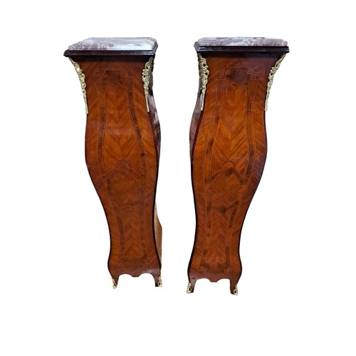 180 - A PAIR OF CONTINENTAL KINGWOOD INLAID AND GILT BRASS MOUNTED COLUMNS each with a rectangular veined ... 