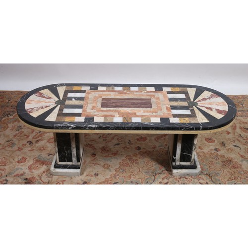 319 - A SPECIMEN MARBLE COFFEE TABLE of oval outline the shaped top inlaid with specimen marble panels on ... 