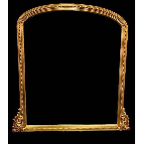 450 - A VICTORIAN STYLE GILTWOOD OVERMANTEL MIRROR the rectangular arched plate within a beadwork frame wi... 