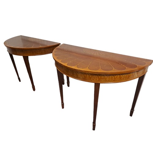 482 - A PAIR OF GEORGIAN STYLE MAHOGANY AND PAINTED SIDE TABLES each of demi lune outline the shaped tops ... 