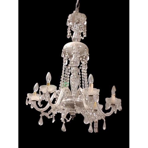 347 - A CONTINENTAL CLEAR GLASS AND FROSTED GLASS SIX BRANCH CHANDELIER hung with faceted chains and penda... 