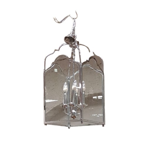 162 - A CHROME THREE LIGHT LANTERN of rectangular form with arched glazed panels 60cm drop x 29cm (w) x 29... 