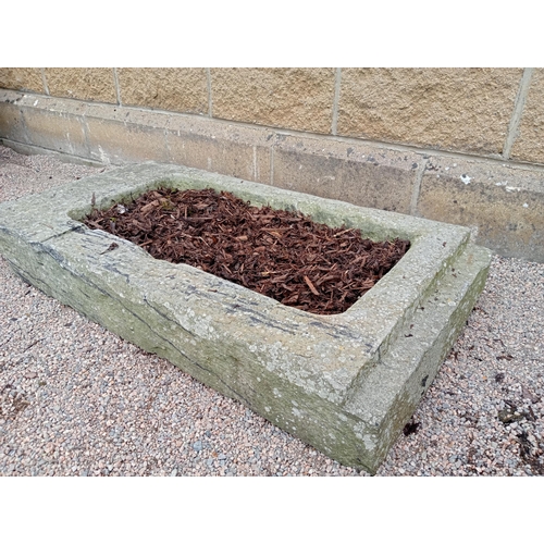 632 - A LIMESTONE TROUGH of rectangular outline 14cm (h) x 111cm (w) x 56cm (d)