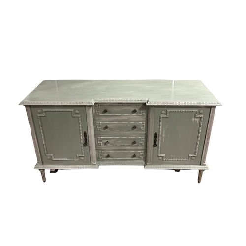 163 - A CONTINENTAL GREY PAINTED SIDE CABINET of inverted breakfront outline the shaped top above four lon... 