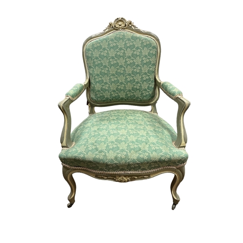 182 - A CONTINENTAL GREY AND WHITE PAINTED UPHOLSTERED ARMCHAIR with upholstered back and seat on cabriole... 