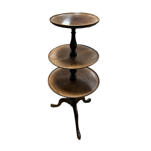 186 - A MAHOGANY THREE TIER DUMBWAITER each circular dish joined by a baluster support on tripod base 90cm... 