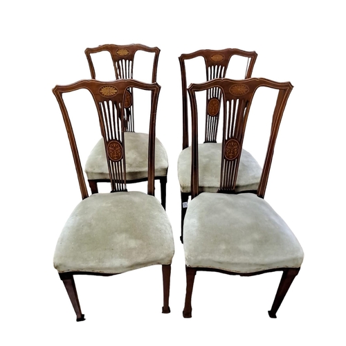 191 - A SET FOUR VINTAGE MAHOGANY INLAID SIDE CHAIRS with pierced splats and upholstered seats on moulded ... 