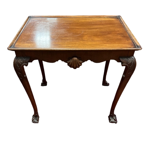 20 - A 19TH CENTURY MAHOGANY SILVER TABLE with shell carved frieze on carved cabriole legs with claw and ... 