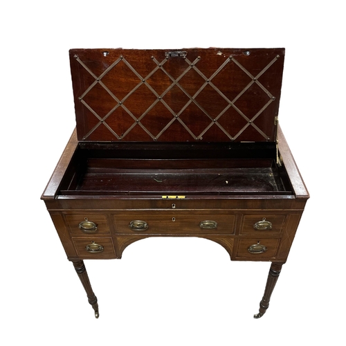 205 - AN EDWARDIAN MAHOGANY AND SATINWOOD INLAID WRITING DESK the rectangular top with hinged compartments... 