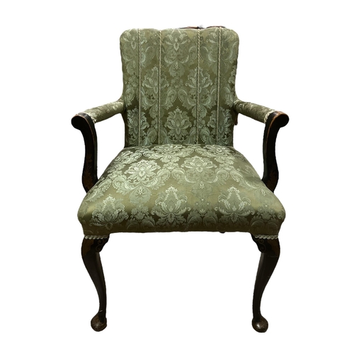 218 - A VINTAGE STAINED WOOD AND UPHOLSTERED ARMCHAIR on cabriole legs