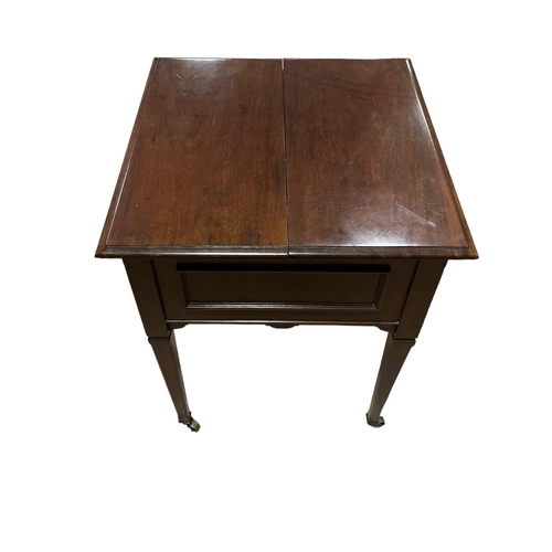 222 - AN EDWARDIAN MAHOGANY DRINKS TABLE the hinged top containing a glazed central tray bears label 'Best... 