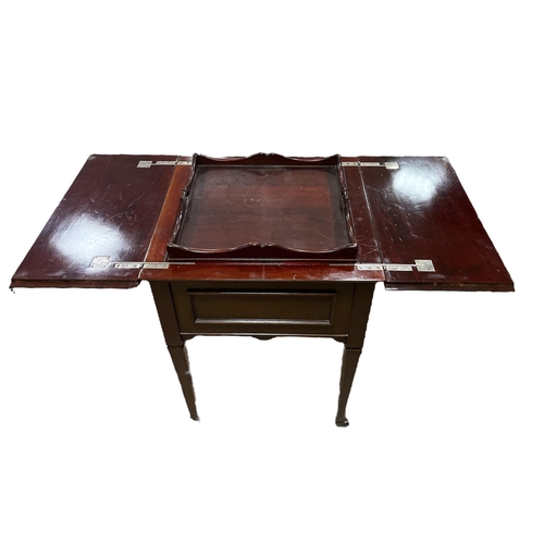 222 - AN EDWARDIAN MAHOGANY DRINKS TABLE the hinged top containing a glazed central tray bears label 'Best... 