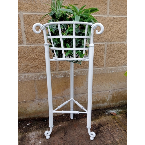 650 - A WROUGHT IRON PLANTER with openwork sides on scroll supports 76cm (h) x 40cm (d)