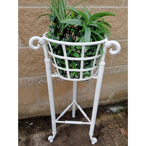 650 - A WROUGHT IRON PLANTER with openwork sides on scroll supports 76cm (h) x 40cm (d)