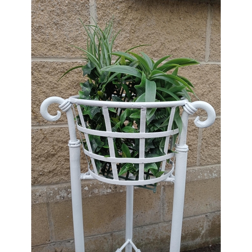 650 - A WROUGHT IRON PLANTER with openwork sides on scroll supports 76cm (h) x 40cm (d)