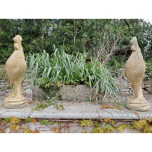 654 - A PAIR OF COTSWOLD FIGURES each modelled as a cockerel shown standing on a naturalistic base 70cm (h... 