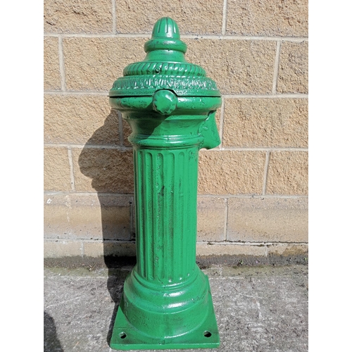 660 - AN IRISH CAST IRON VILLAGE WATER PUMP of typical form 100cm (h) x 36cm (w) x 40cm (d)