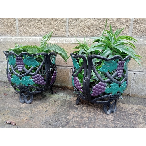 665 - A PAIR OF CAST IRON AND POLYCHROME OPENWORK BASKETS with vine decoration 30cm (h) x 34cm (d)