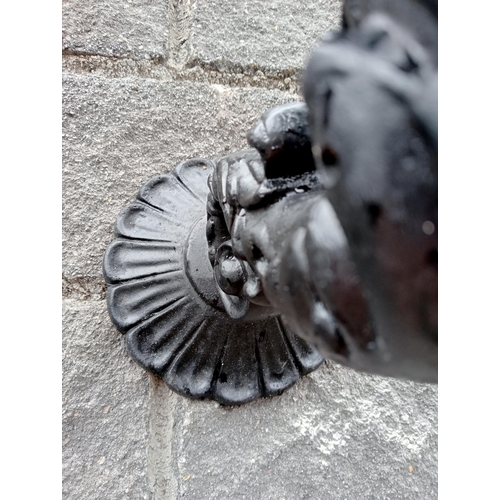 666 - A PAIR OF CAST ALUMINIUM WALL SCONCES with globe shades 50cm (h) x 25cm (w) x 50cm (d)