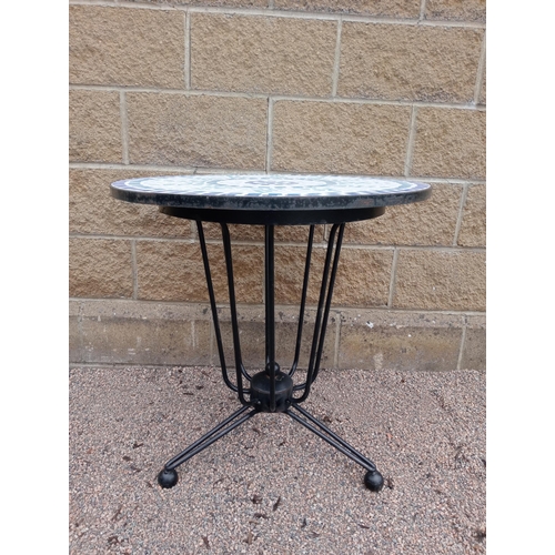 667 - A WROUGHT IRON AND MOSAIC GARDEN TABLE of circular form 74cm (h) x 60cm (d)