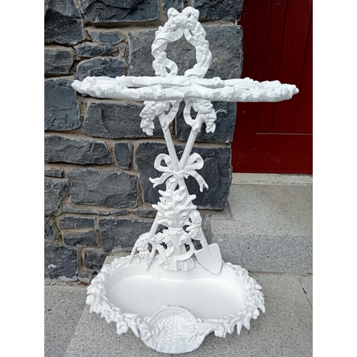 682 - A CAST IRON FOLIATE CAST FRAME TWO COMPARTMENT STICK STAND 63cm (h) x 40cm (w) x 26cm (d)