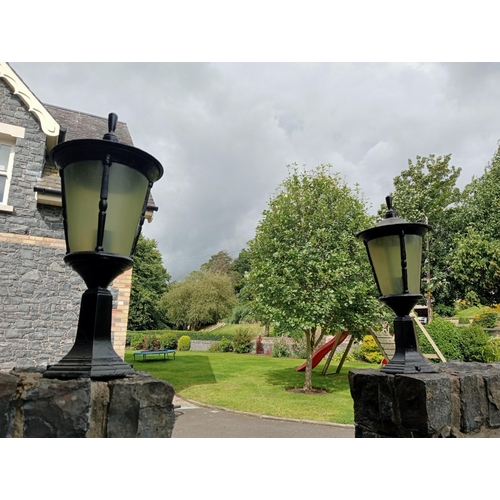 684 - A PAIR OF CAST ALUMINIUM OUTSIDE PIER LIGHTS each of cylindrical tapering form 56cm (h) x 26cm (d)