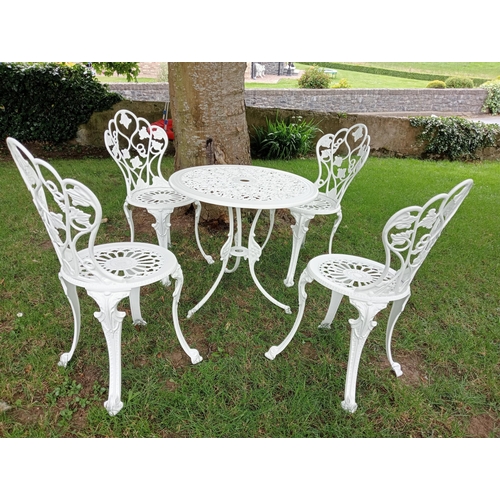 685 - A FIVE PIECE ALUMINIUM PATIO SUITE comprising four chairs and table of circular form on splayed legs... 