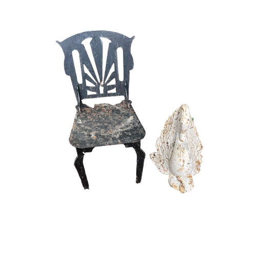 686 - A BLACK CAST METAL CHILD'S GARDEN CHAIR, a cast iron figure modelled as a swan